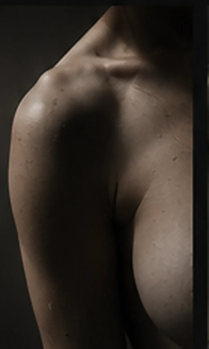 Abstract editorial study of a torso in sculptural side light