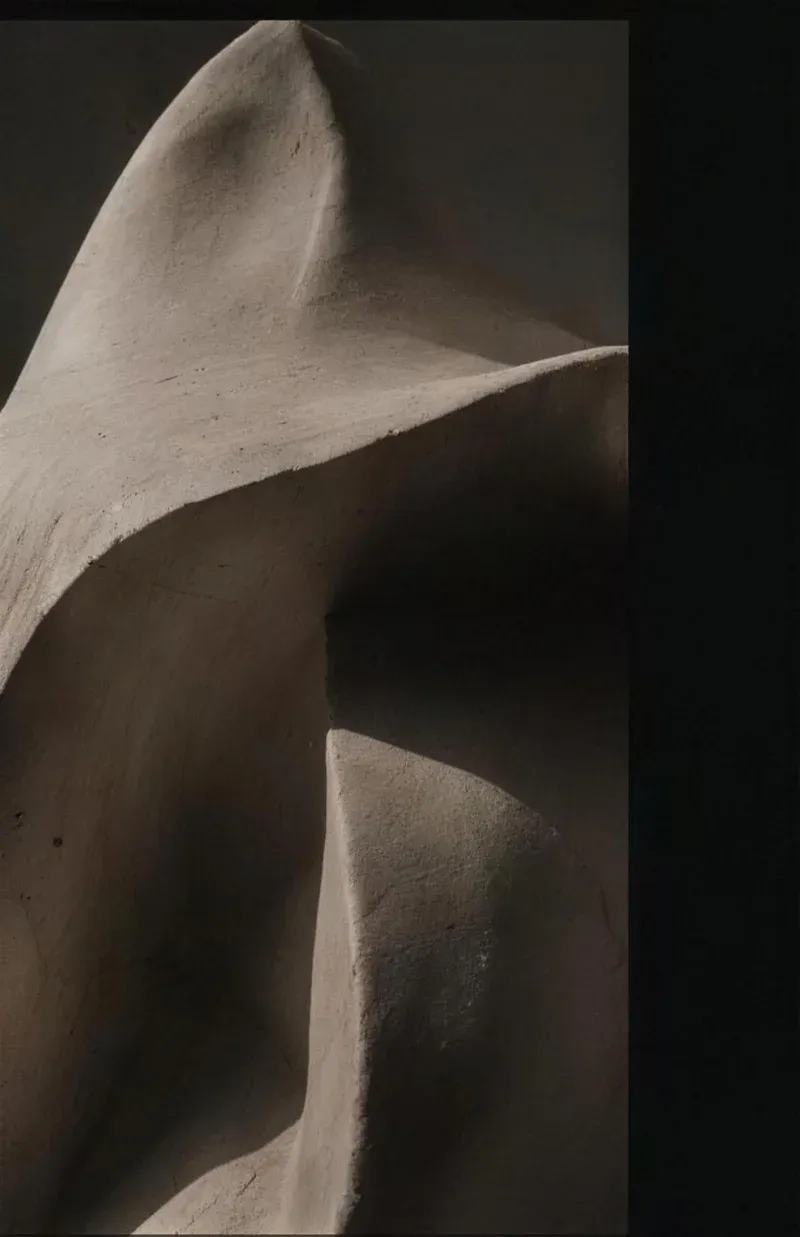 A study of repaired material in warm directional light, suggesting restored form